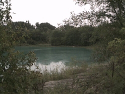 Pond near Sondrol Drive - note deep blue-green color (lime from concrete?)